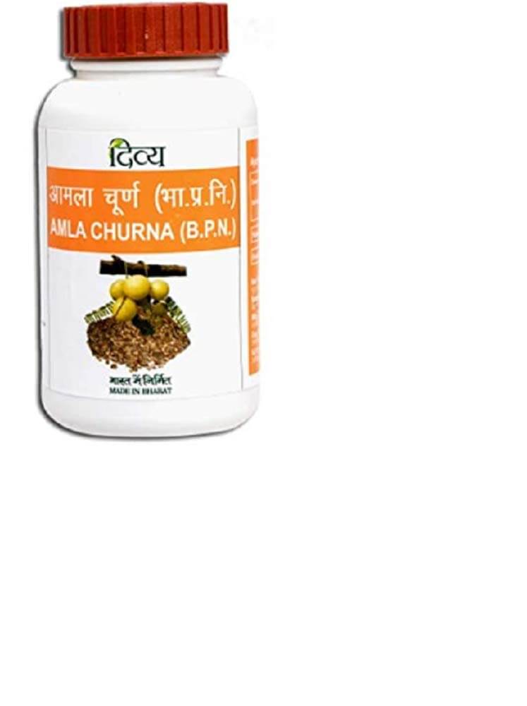 Amla powder mixed with honey in a glass for natural immunity boost